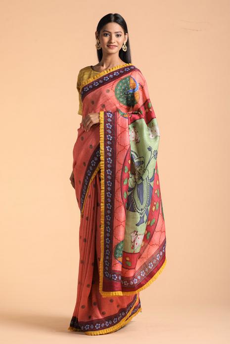A handwoven tussar linen fabric saree in pink colour with a beautiful intricate print featuring traditional Pichwai motifs.